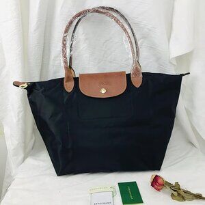 Longchamp Black and Brown Tote Bag with Sleek Design